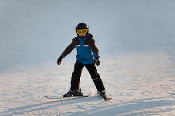 Image showing Young boy skiing