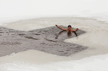 Image showing Man in ice cold water