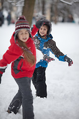 Image showing Children playing with snow