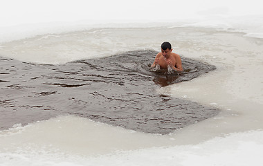 Image showing Man in ice cold water