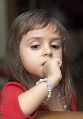 Image showing Thoughtful little girl