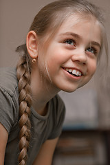 Image showing Smiling girl with braided hair 