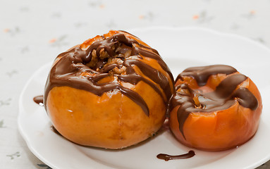 Image showing Baked apple and canned peach covered with chocolate