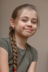 Image showing Beautiful smiling girl, hair braided