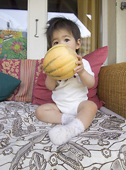 Image showing Anael with melon