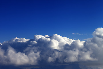 Image showing Blue sky and mountains covered with clouds