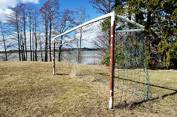 Image showing old soccer goal on the village sports field