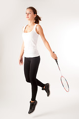 Image showing Beautiful girl with a racket in hands