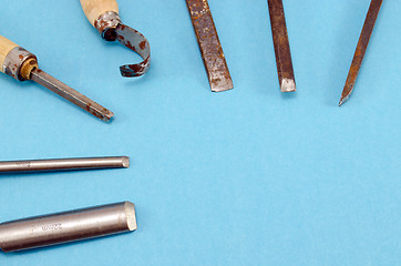 Image showing chisel graver carve tools set on blue 