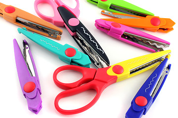 Image showing Brightly colors craft scissors on a white background