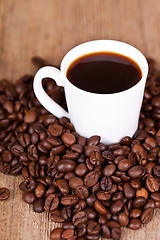 Image showing cup of coffee and beans 