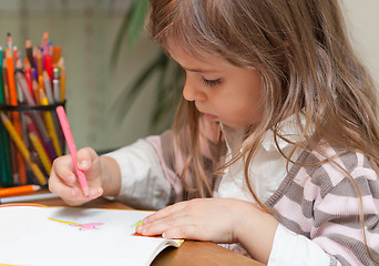 Image showing Little girl drawing