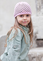 Image showing Little girl in knit pink hat