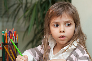 Image showing Little girl drawing