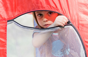 Image showing Beautiful little girl in a tent