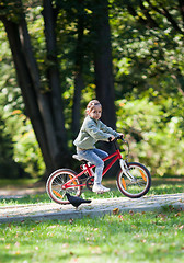 Image showing Little girl riding bike