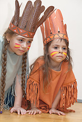 Image showing Two little girls playing Indians