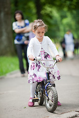 Image showing Cute little girl on bike