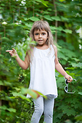 Image showing Little girl in the forest