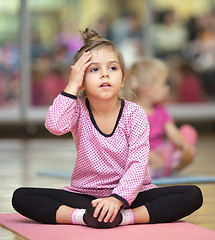 Image showing Little girl on mat