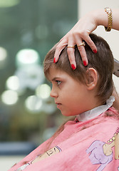 Image showing Boy at hairdresser's shop