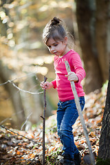 Image showing Little girl hiking in the woods