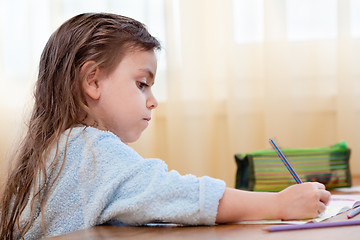 Image showing Little girl drawing 