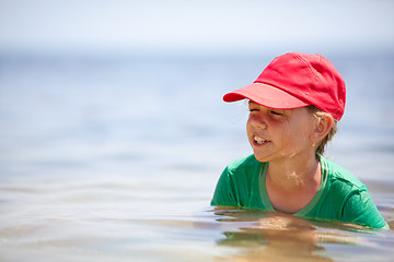 Image showing Little girl in the sea