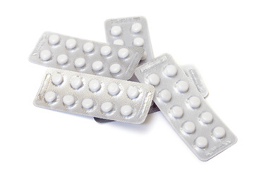 Image showing White pills packed in blisters