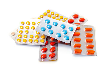 Image showing Multicolored pills packed in blisters