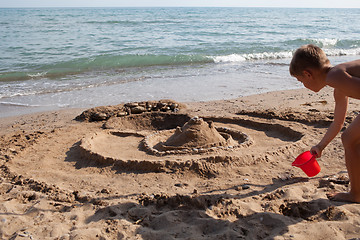 Image showing Building sand castle