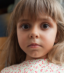 Image showing Little girl with innocent expression