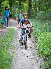 Image showing Children on a bicycle