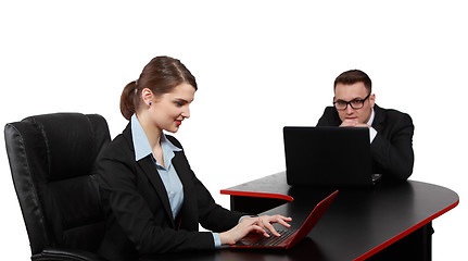 Image showing Young Business Couple on Laptops