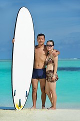 Image showing happy young  couple enjoying summer on beach