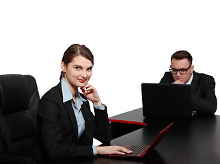 Image showing Young Business Couple on Laptops