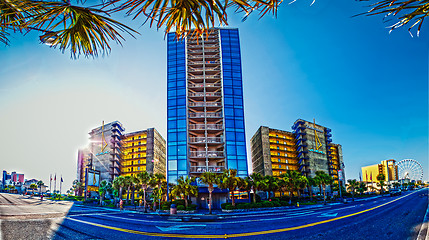 Image showing beach scene,  blue sky and hotel