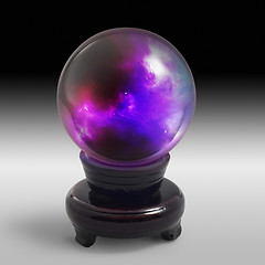 Image showing crystal ball on stand in light back