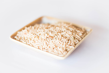 Image showing Brown rice cereal food on clean table