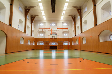 Image showing Empty interior of public gym with basketball court