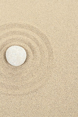 Image showing zen stone in sand with circles