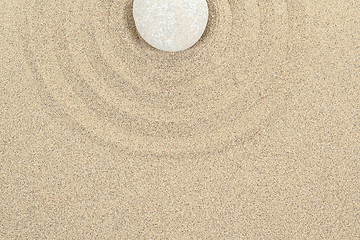 Image showing zen stone in sand with circles