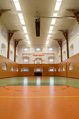 Image showing Empty interior of public gym with basketball court