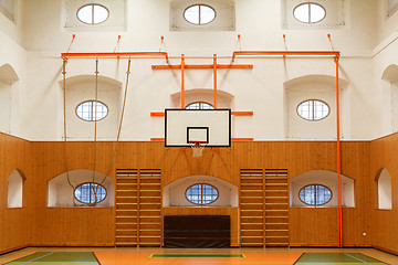 Image showing Empty interior of public gym with basketball court