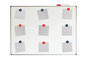 Image showing Whiteboard with papers and magnets