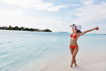 Image showing beautiful gril on beach have fun