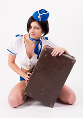 Image showing Beautiful air stewardess with suitcase