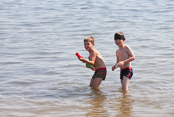 Image showing Water pistol action