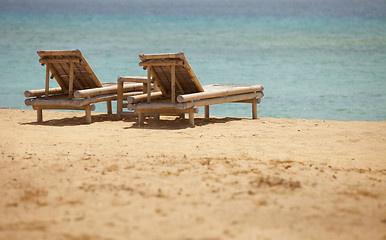 Image showing Two bamboo deck chairs in retro style