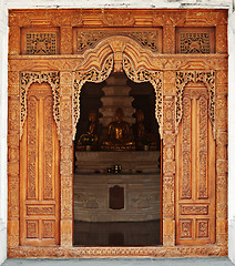 Image showing Temple entrance decorated with wooden carvings. Indonesia